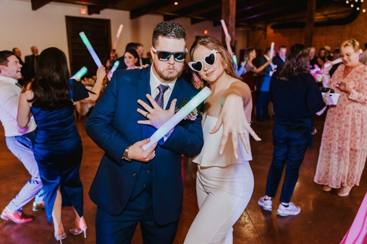 Foam glow sticks on a wedding dance floor.