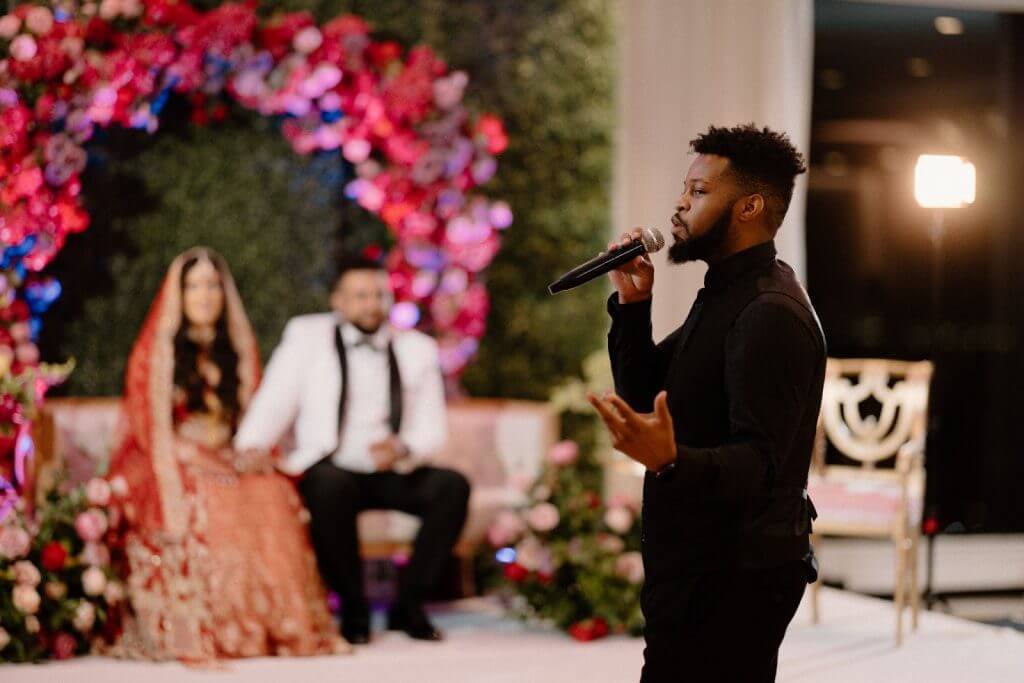 Toast Entertainment wedding MC announcing at a reception