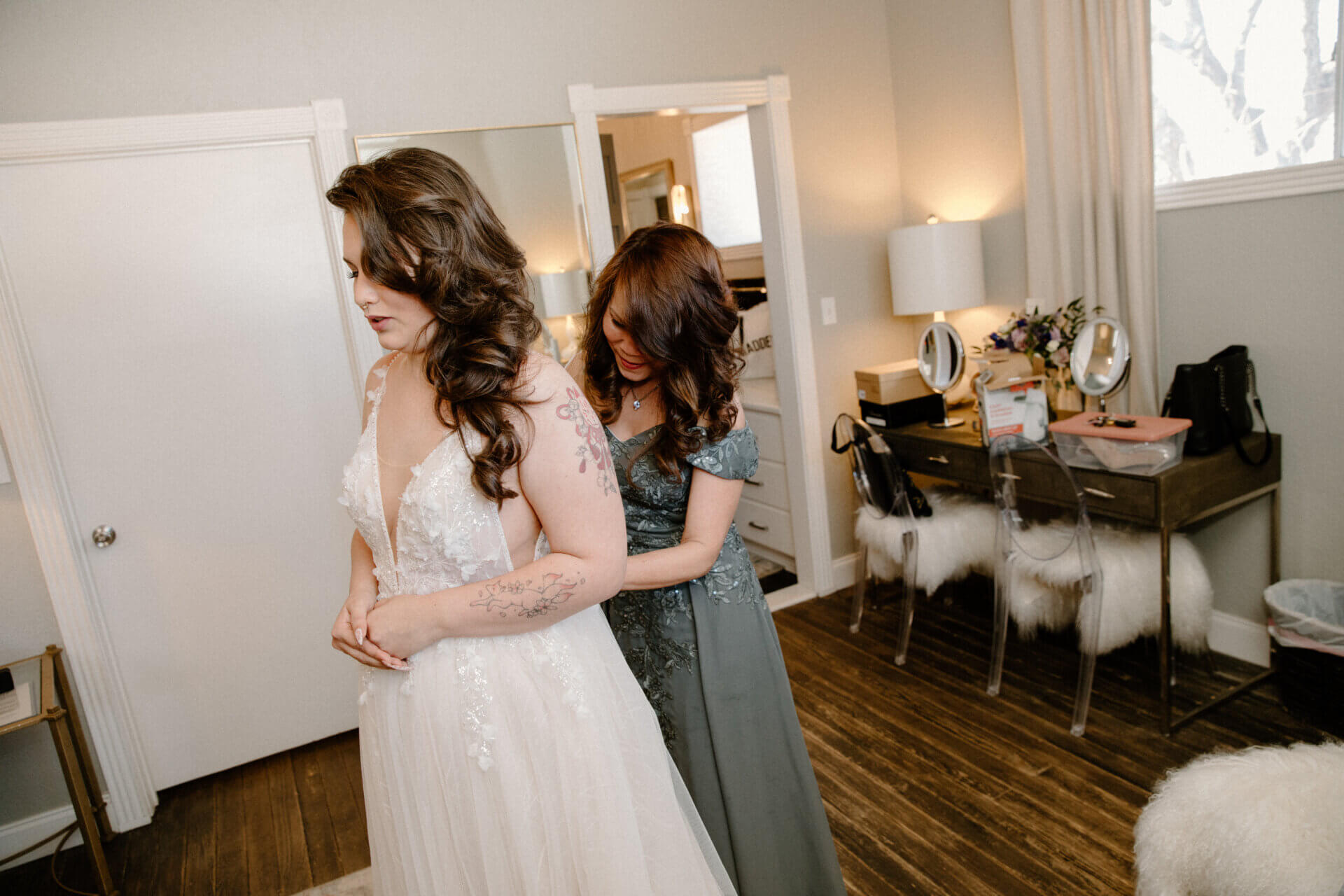 Bride getting ready in the private Ready Room suite at Stonehouse Villa, Driftwood TX wedding venue